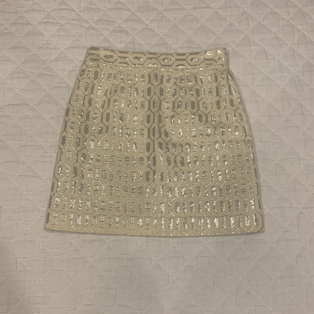 Ivory/light beige skirt with beautiful silver metallic detail pattern.